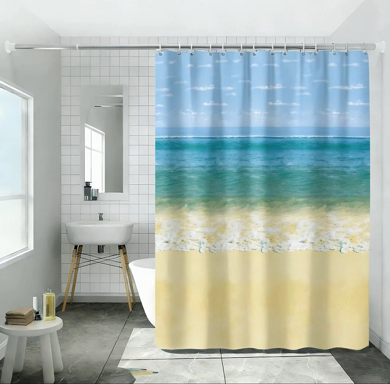 Ocean beach-pattern shower curtain in a bright contemporary bathroom
