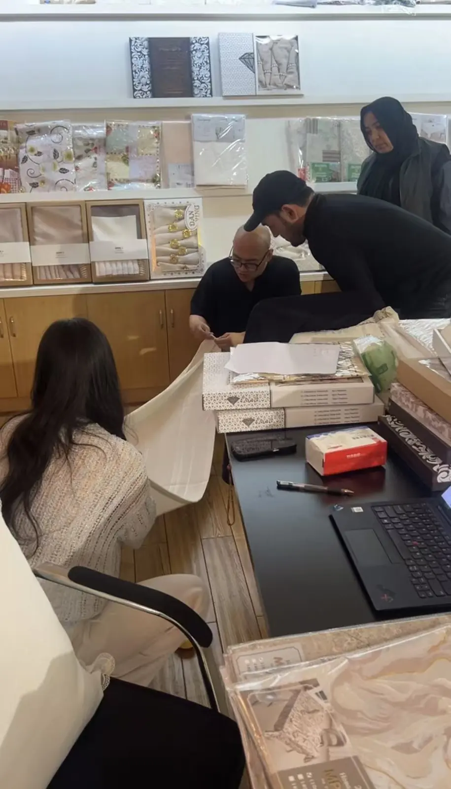 On-site review of table linen samples at Haining Danli Textile