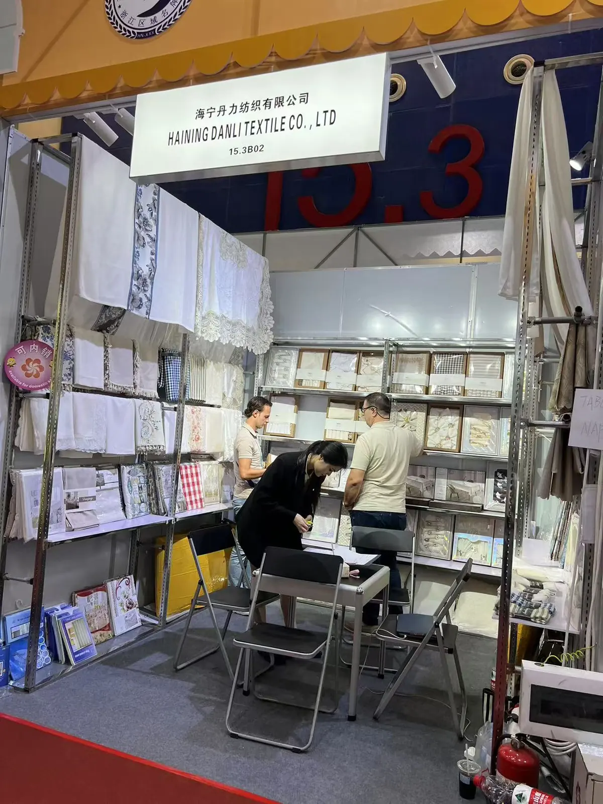 Table linen collections displayed inside Danli booth 15.3B02