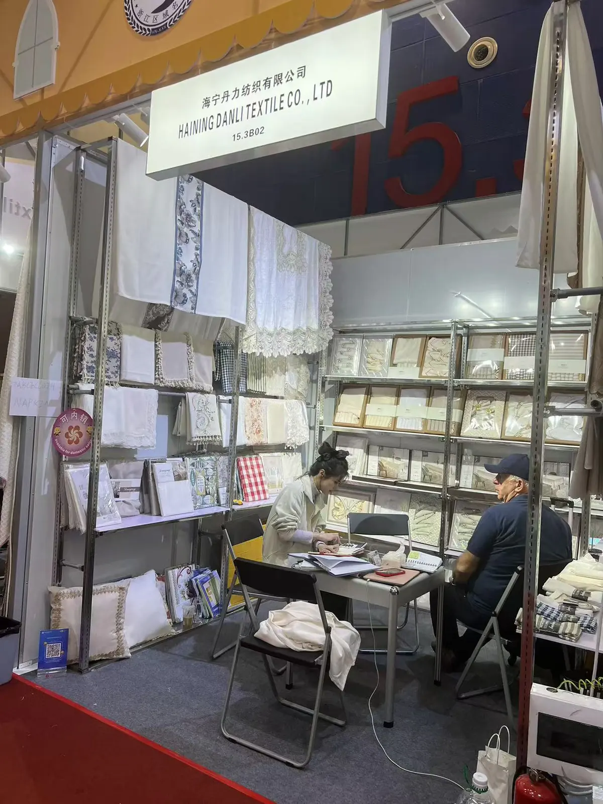 A one-to-one product discussion at Danli booth 15.3B02