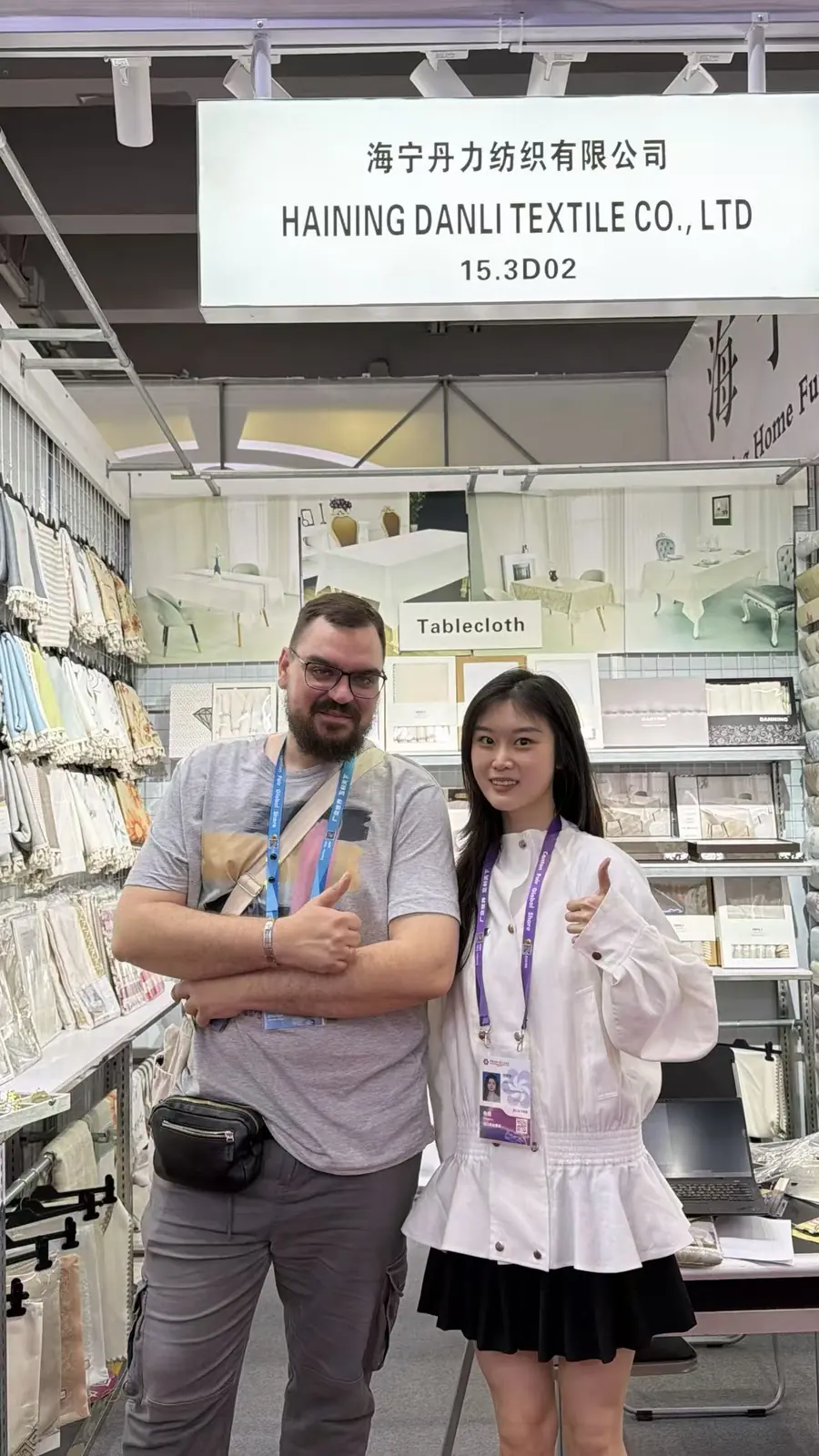 A visitor with a Danli representative in the exhibition booth