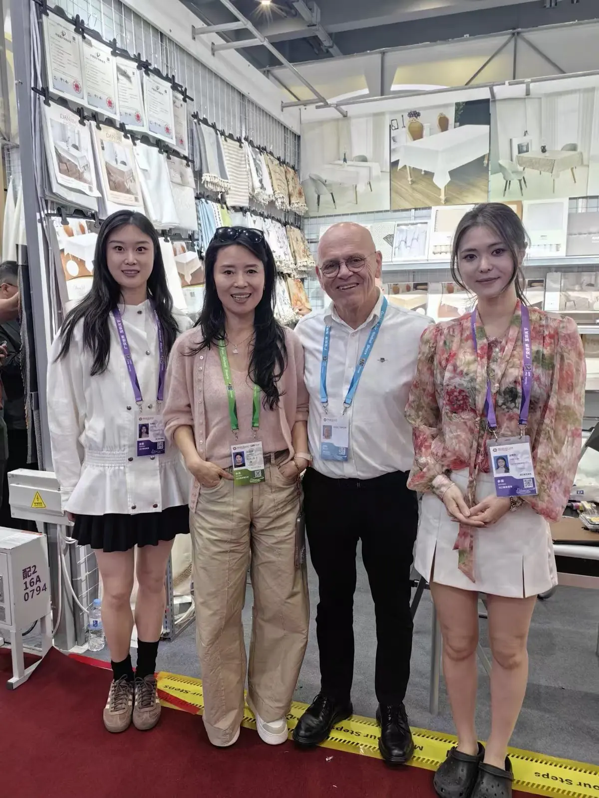 Danli team members welcoming a visitor at the Canton Fair